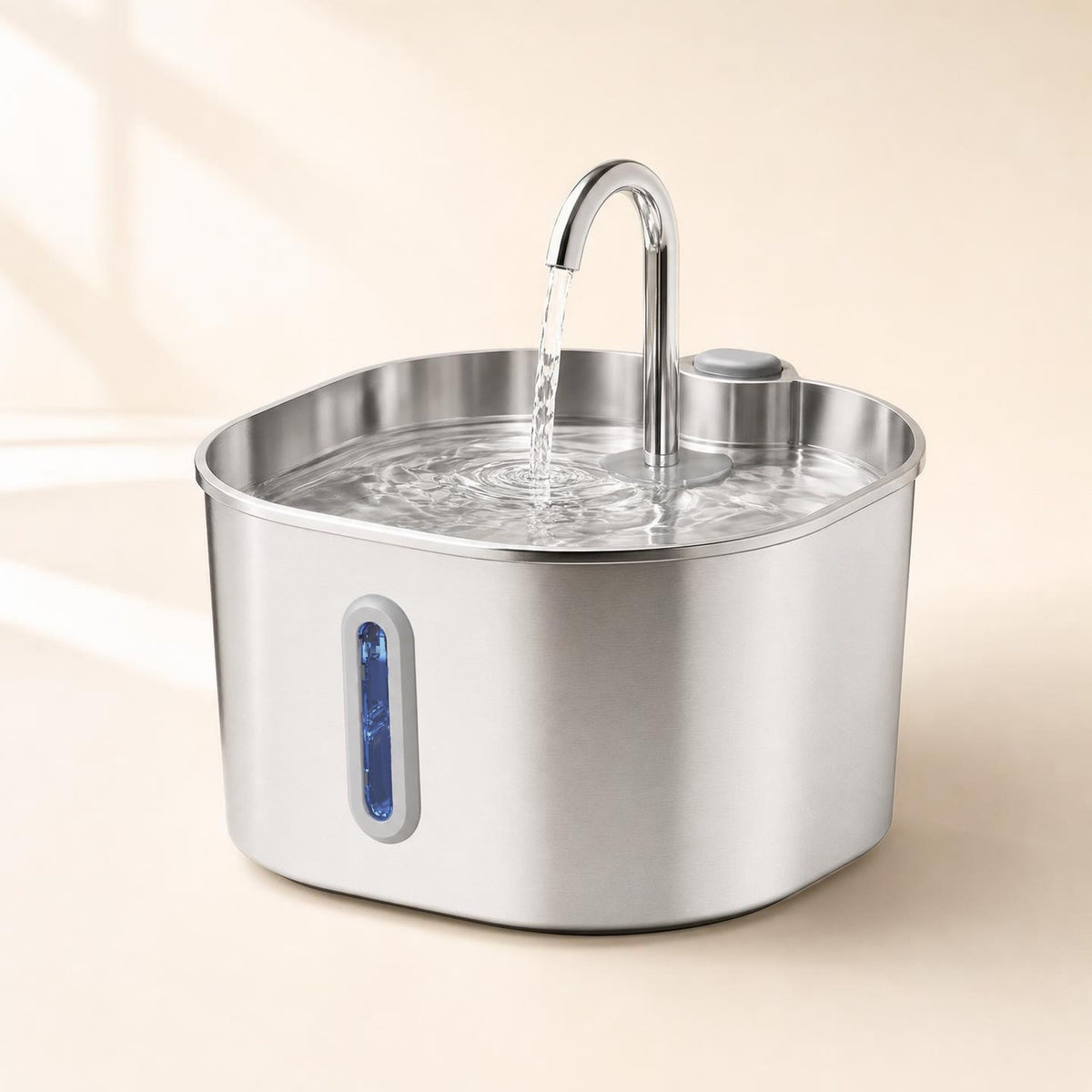 La fontaine inox avec son robinet, l'eau qui coule et la fenêtre de niveau